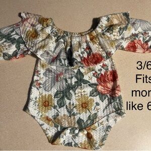 Handmade floral onesie